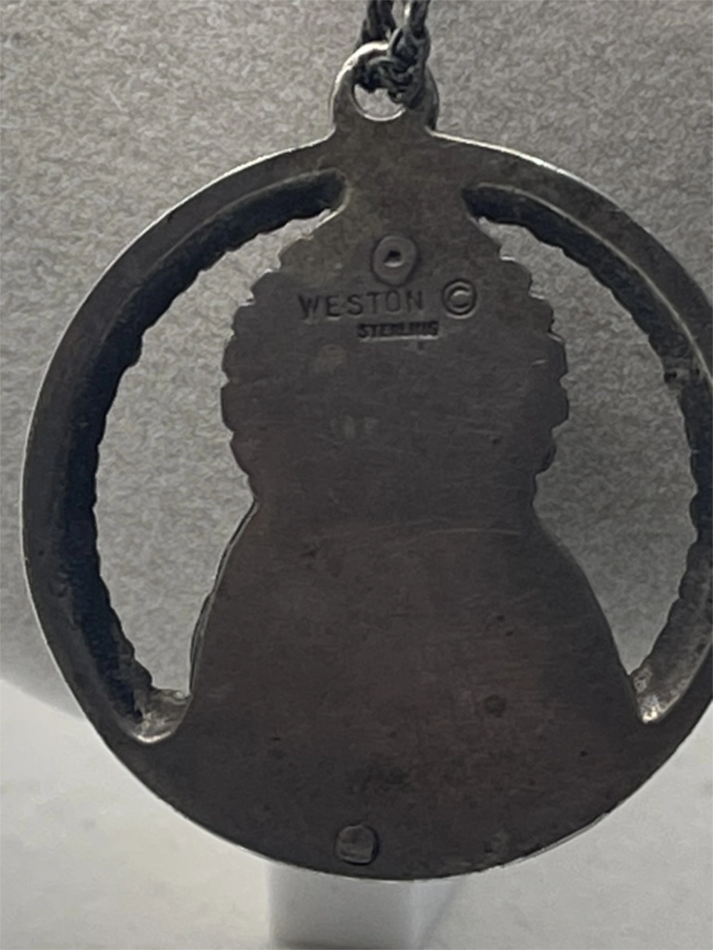 Back of Vintage Lang Fisher Sterling Silver Loop Cross Pendant Necklace with Weston © Sterling etched