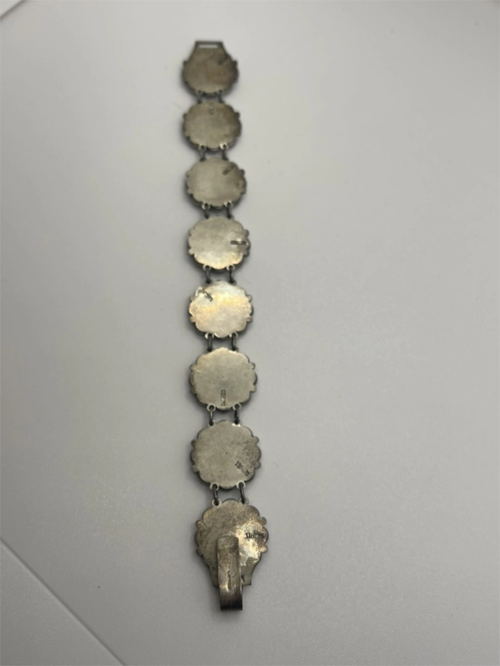 Back of the Vintage Zuni Turquoise Flower Necklace, Bracelet and Earrings